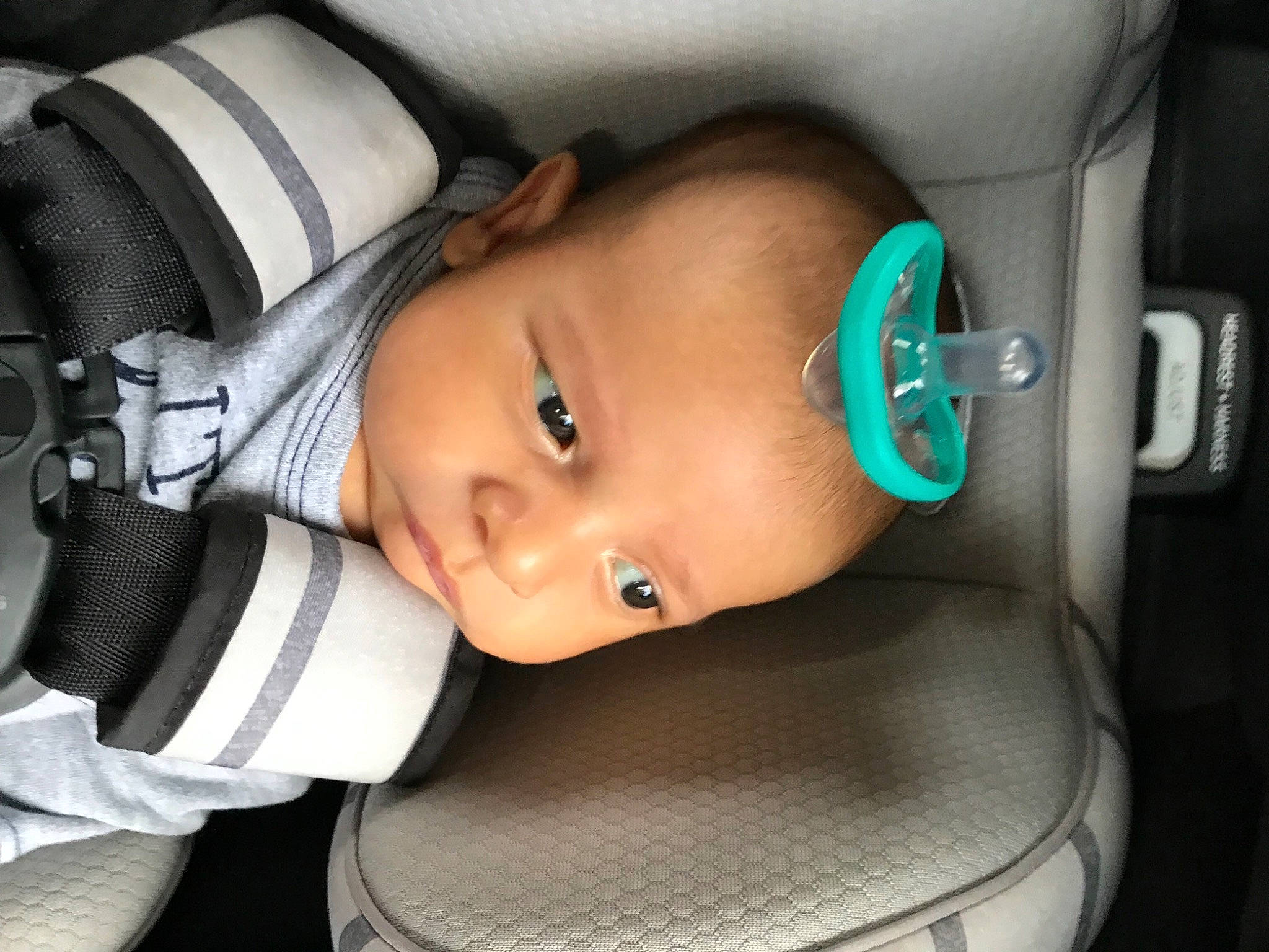 Levi is registered to the contest to win money with this photo: audio_equipment, baby, baby_carriage, cheek, chin, comfort, cool, ear, eye, eyebrow, eyelash, flash_photography, headgear, iris, lip, mouth, nose, person, product, skin