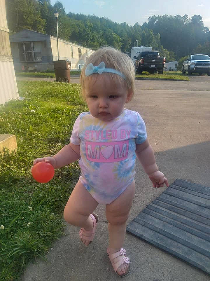 Aurelia joined the competition — help win amazing prizes! asphalt, baby_toddler_clothing, car, child, fun, grass, human_leg, leisure, person, pink, plant, recreation, sky, summer, t_shirt, thigh, tire, toddler, tree, vehicle