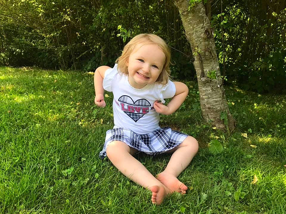Gabrielle joined the competition — help win amazing prizes! baby_toddler_clothing, barefoot, botany, child, fun, grass, grassland, groundcover, happy, human_leg, joy, lawn, leisure, meadow, natural_environment, people_in_nature, person, plant, smile, summer