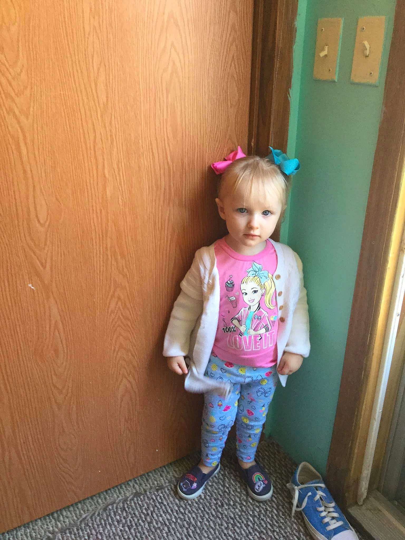 Gabrielle joined the competition — help win amazing prizes! baby_toddler_clothing, child, chin, design, door, floor, flooring, footwear, hardwood, joint, leg, magenta, person, pink, sleeve, t_shirt, textile, toddler, walking_shoe, wood