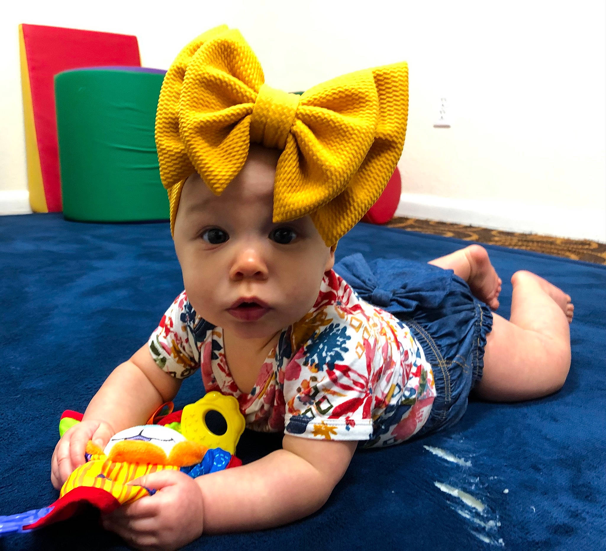 Arilynn joined the competition — help win amazing prizes! baby, baby_playing_with_toys, baby_products, baby_toddler_clothing, baby_toys, cap, child, costume_hat, fashion_accessory, flooring, fun, happy, hat, leisure, person, play, room, sitting, toddler, toy