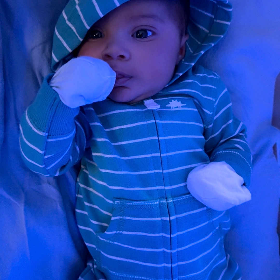 Keyon joined the competition — help win amazing prizes! baby, baby_clothes, blanket, blue_color, calm, child, closeup, cute, face, hood, indoors, infant, lying_down, mittens, onesie, portrait, sleepwear, soft_fabric, striped_clothing, young_child