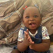 Egypt joined the competition — help win amazing prizes! adorable, baby, bed, bedroom, child, clapping, close_up, denim_overalls, eyes, face, floral_shirt, hair_bows, happy, indoors, infant, pillows, portrait, sitting, smiling, sunlight
