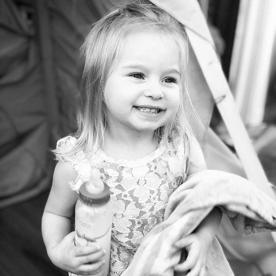 Madison is registered to the contest to win money with this photo: black_and_white, blond, child, child_model, eye, face, facial_expression, fun, iris, joy, monochrome, monochrome_photography, people, person, photograph, photography, portrait, portrait_photography, smile, snapshot