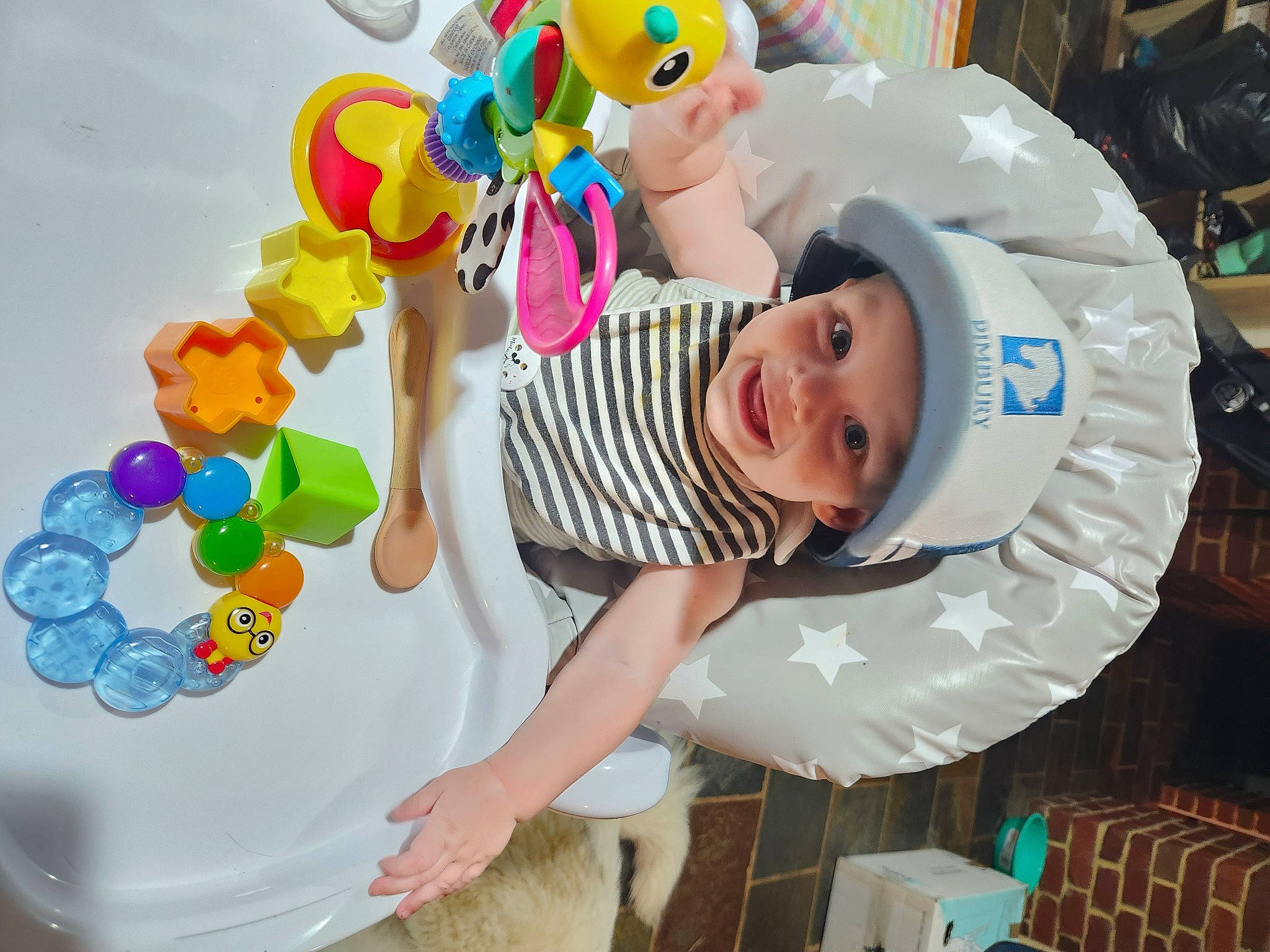 Chayse is registered to the contest to win money with this photo: baby, baby_toddler_clothing, child, event, facial_expression, fun, gesture, happy, hat, headwear, leisure, party, party_supply, people, person, product, room, shorts, smile, t_shirt