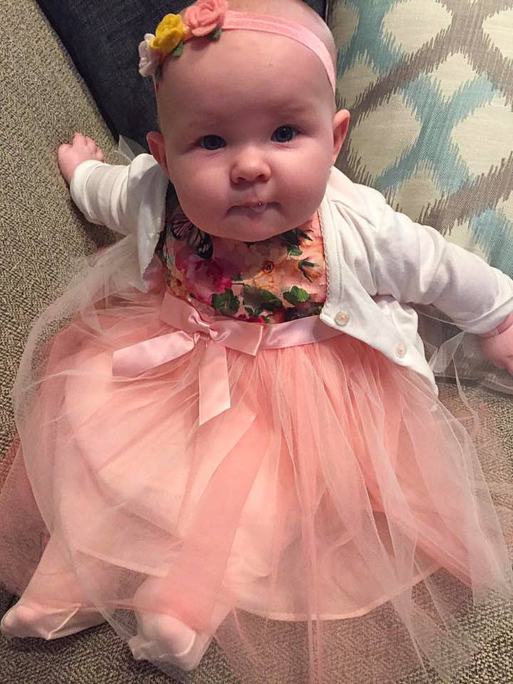 Kaislee is registered to the contest to win money with this photo: child, costume, dance_dress, doll, dress, girl, hair_accessory, infant, peach, person, pink, product, skin, textile, toddler