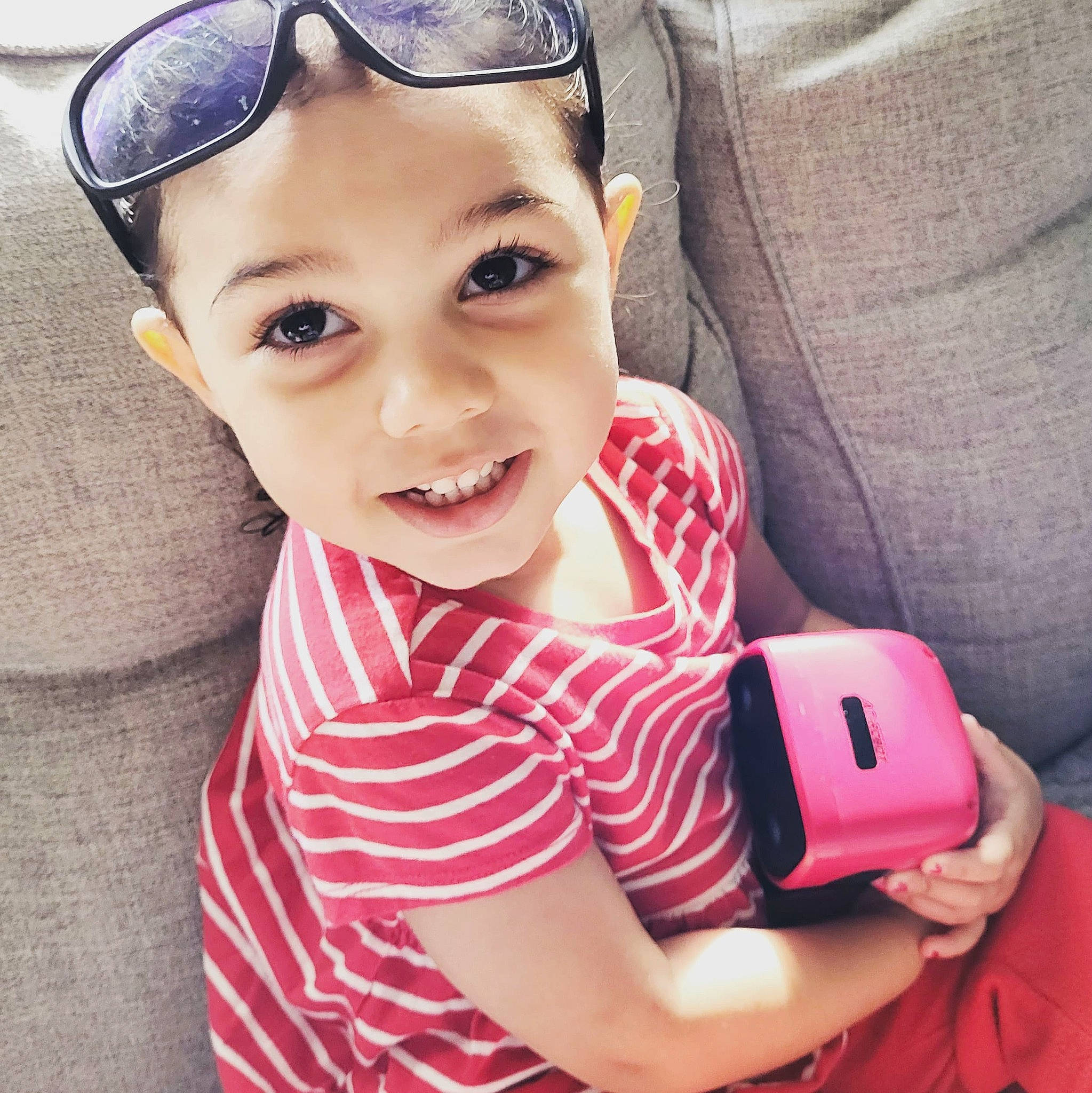 Aleera joined the competition — help win amazing prizes! baby_toddler_clothing, clothing, eye, eyelash, face, finger, gadget, glasses, goggles, hand, happy, head, lip, person, pink, skin, sleeve, smile, sunglasses, vision_care