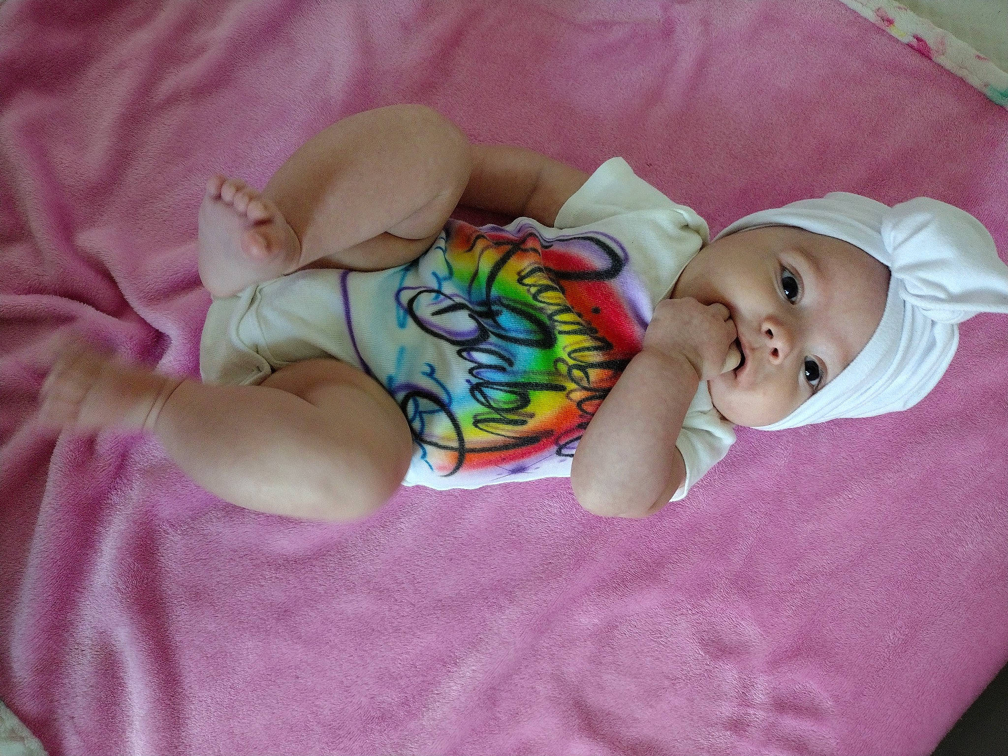 Alannah is registered to the contest to win money with this photo: baby, baby_products, baby_sleeping, baby_toddler_clothing, cheek, child, comfort, eye, hand, head, headgear, headwear, human_body, linens, nail, pattern, person, pink, product, skin