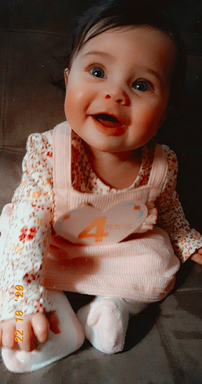 Miracle joined the competition — help win amazing prizes! baby, cheek, child, dress, eye, face, facial_expression, head, lip, nose, person, skin, smile, toddler