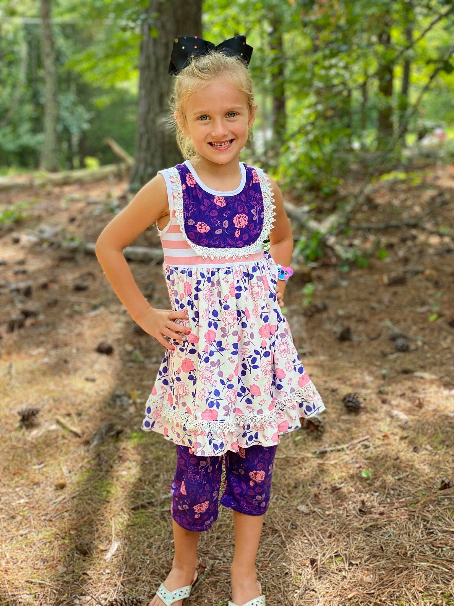 Bailey is registered to the contest to win money with this photo: child, child_model, clothing, design, dress, fawn, joy, pattern, person, plant, smile, toddler