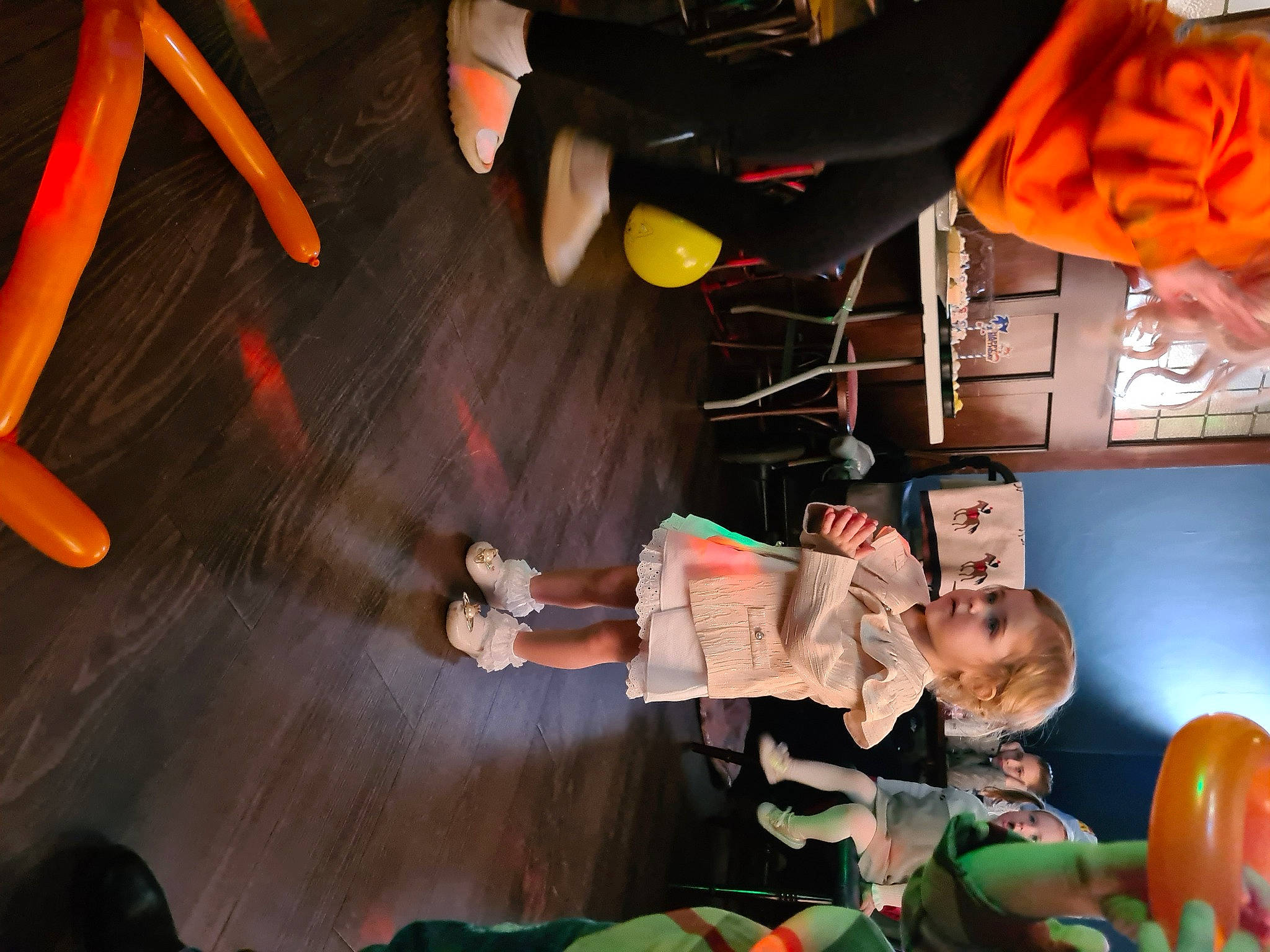 Jorgiana is registered to the contest to win money with this photo: chair, community, entertainment, event, fashion, flooring, fun, leg, leisure, music, orange, performance, performance_art, performing_arts, person, public_event, room, snapshot, tree, wood