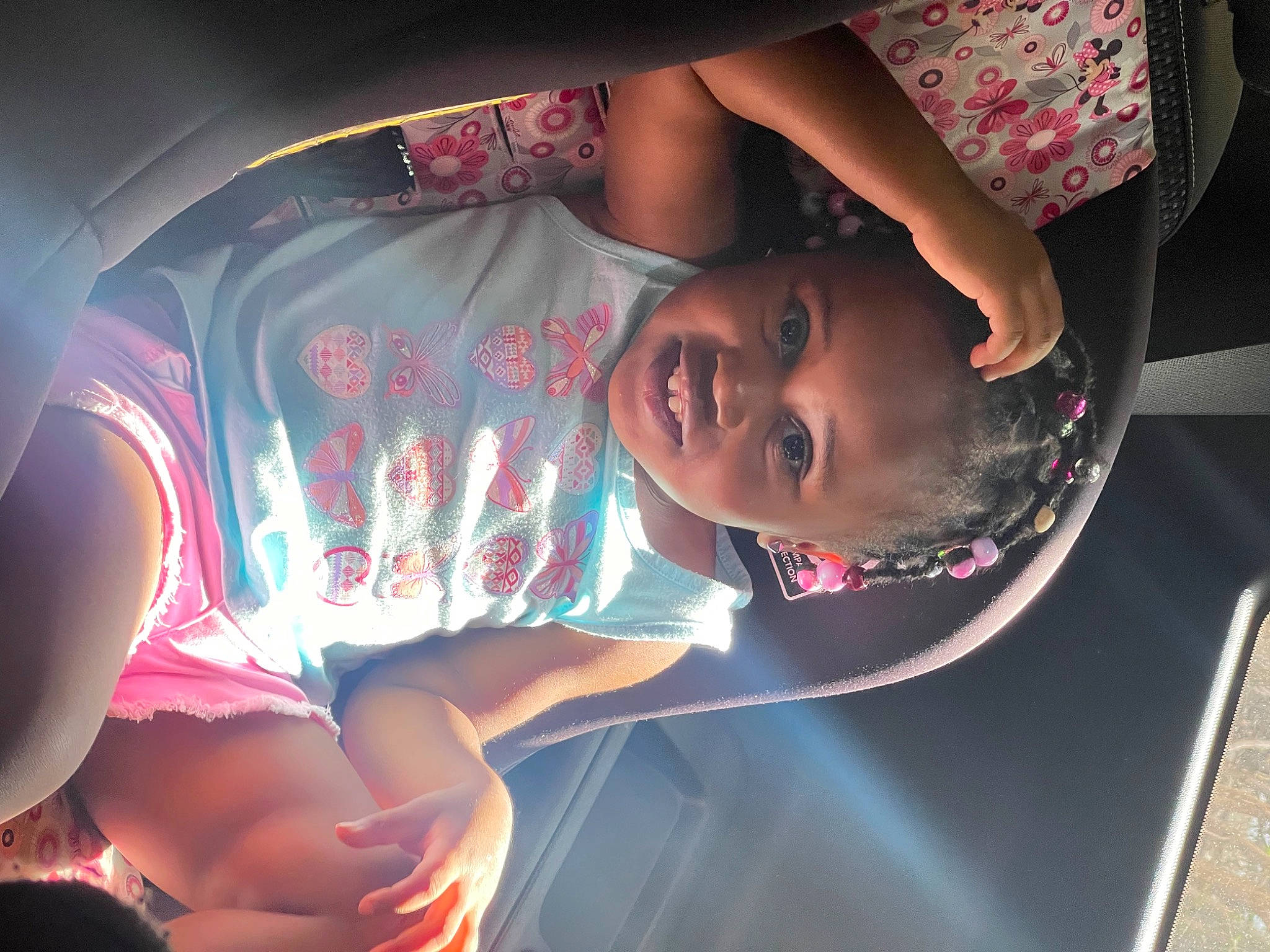 Noelle is registered to the contest to win money with this photo: automotive_lighting, black_hair, child, cool, elbow, event, eyewear, flash_photography, flesh, fun, happy, human_leg, leisure, magenta, mouth, person, purple, room, space, t_shirt