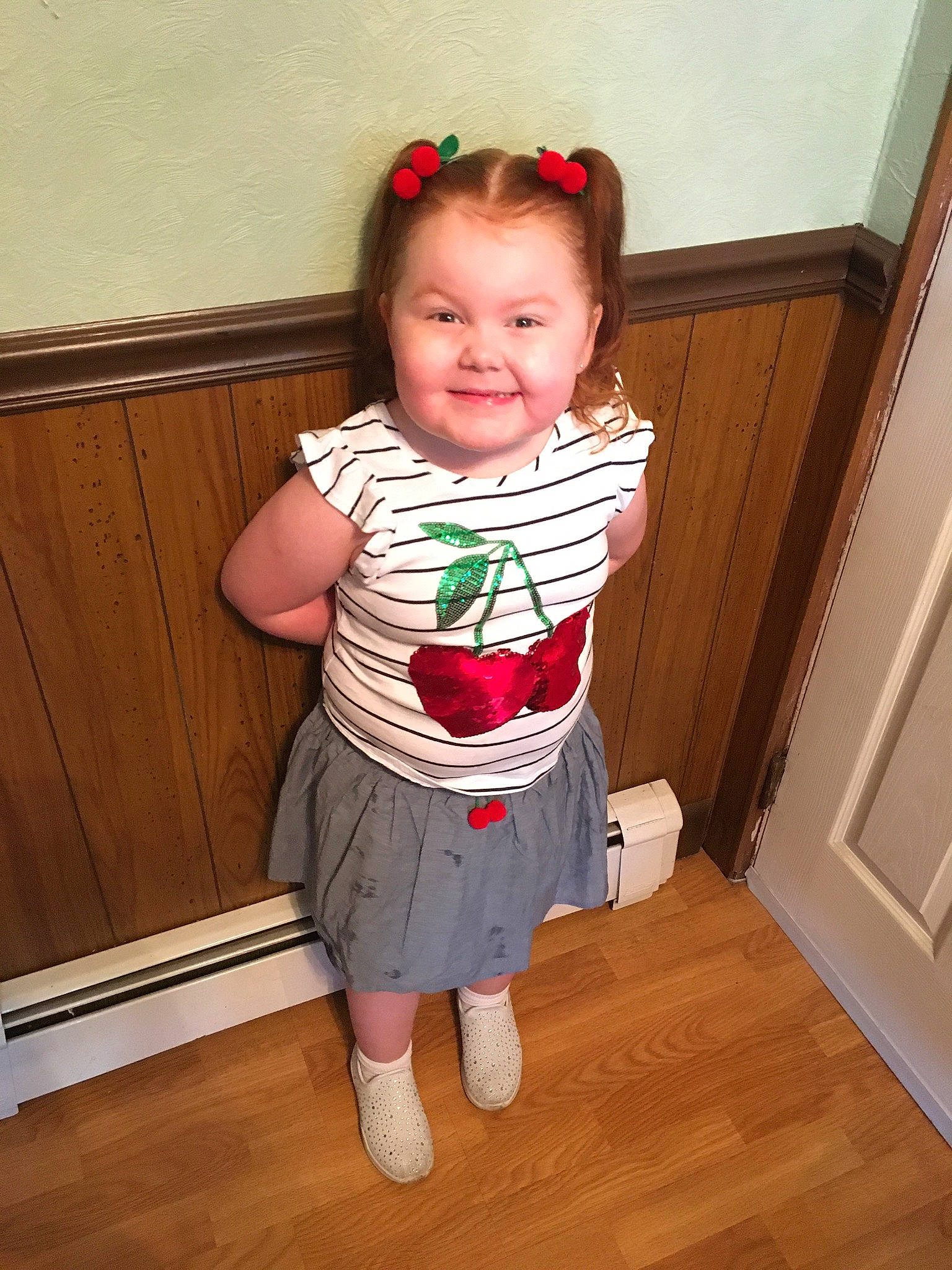 Destiny joined the competition — help win amazing prizes! baby, baby_toddler_clothing, child, costume, door, dress, face, flooring, happy, hardwood, joy, pattern, person, sleeve, smile, standing, toddler, varnish, waist, wood