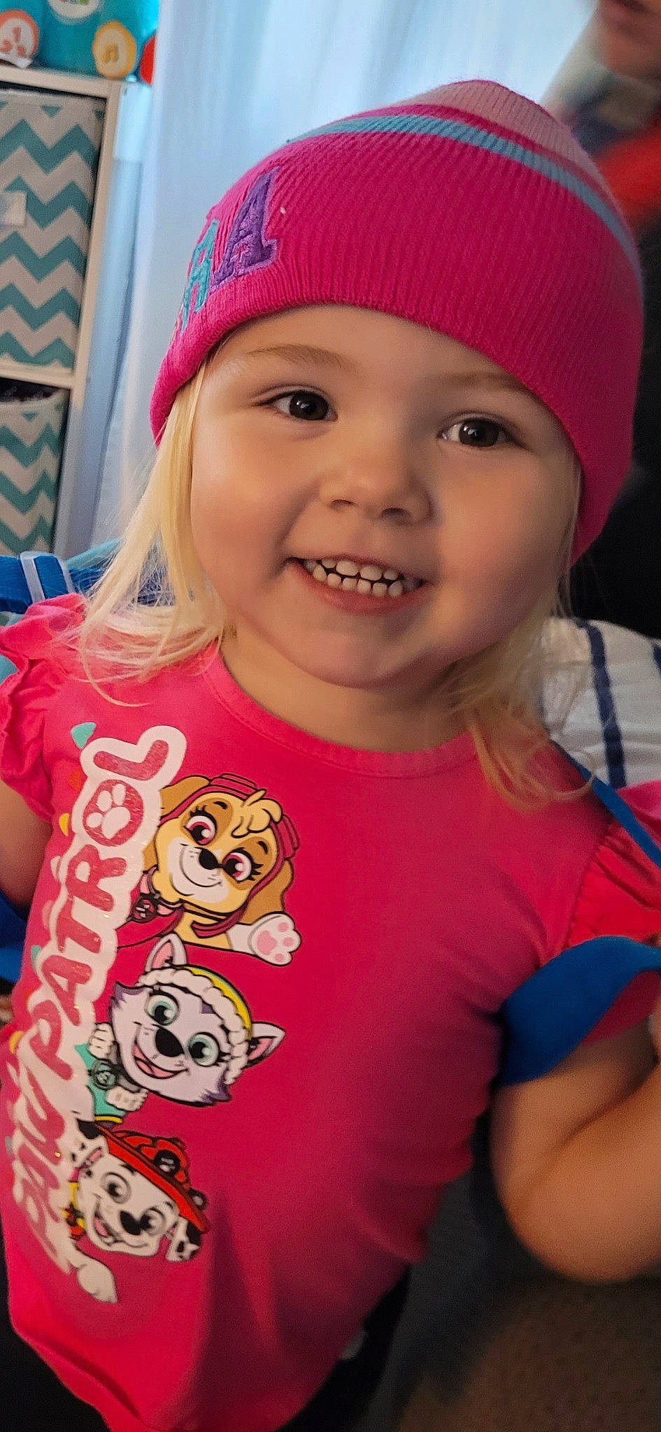 Aryanna is registered to the contest to win money with this photo: cap, cheek, child, chin, cool, eye, face, facial_expression, fun, happy, headwear, joy, lip, mouth, organ, person, pink, red, skin, sleeve
