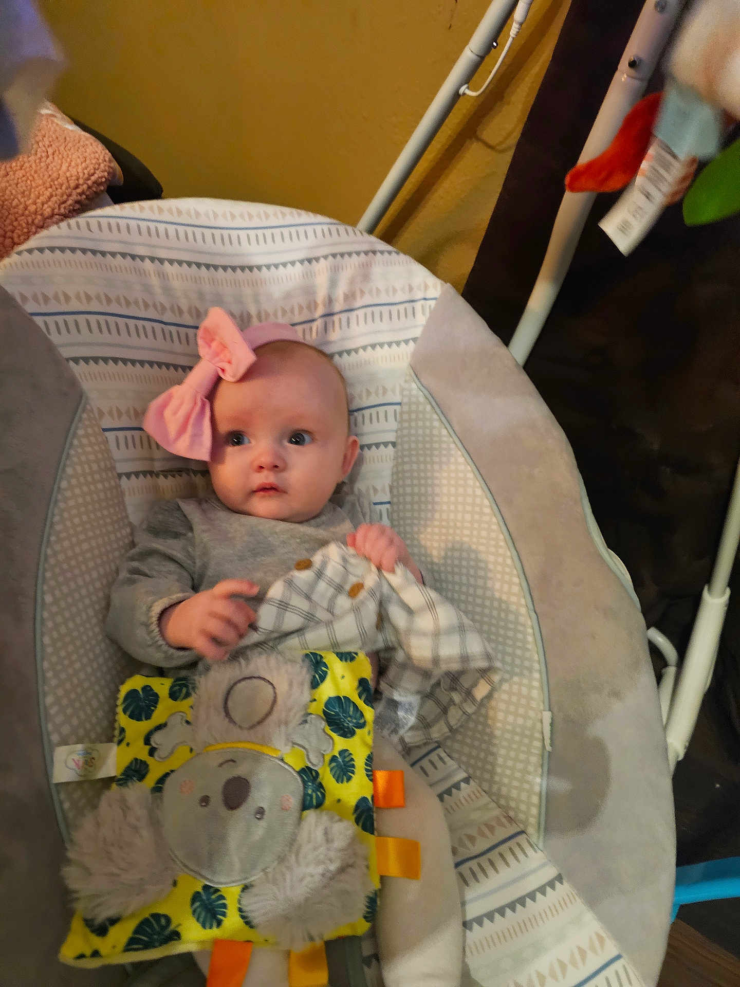 Nysa joined the competition — help win amazing prizes! baby, infant, child, headband, bow, bouncer, baby_seat, blanket, plush_toy, koala, toy, fabric_pattern, striped_pattern, hands, eyes, face, cute, indoor, soft_toy, gaze