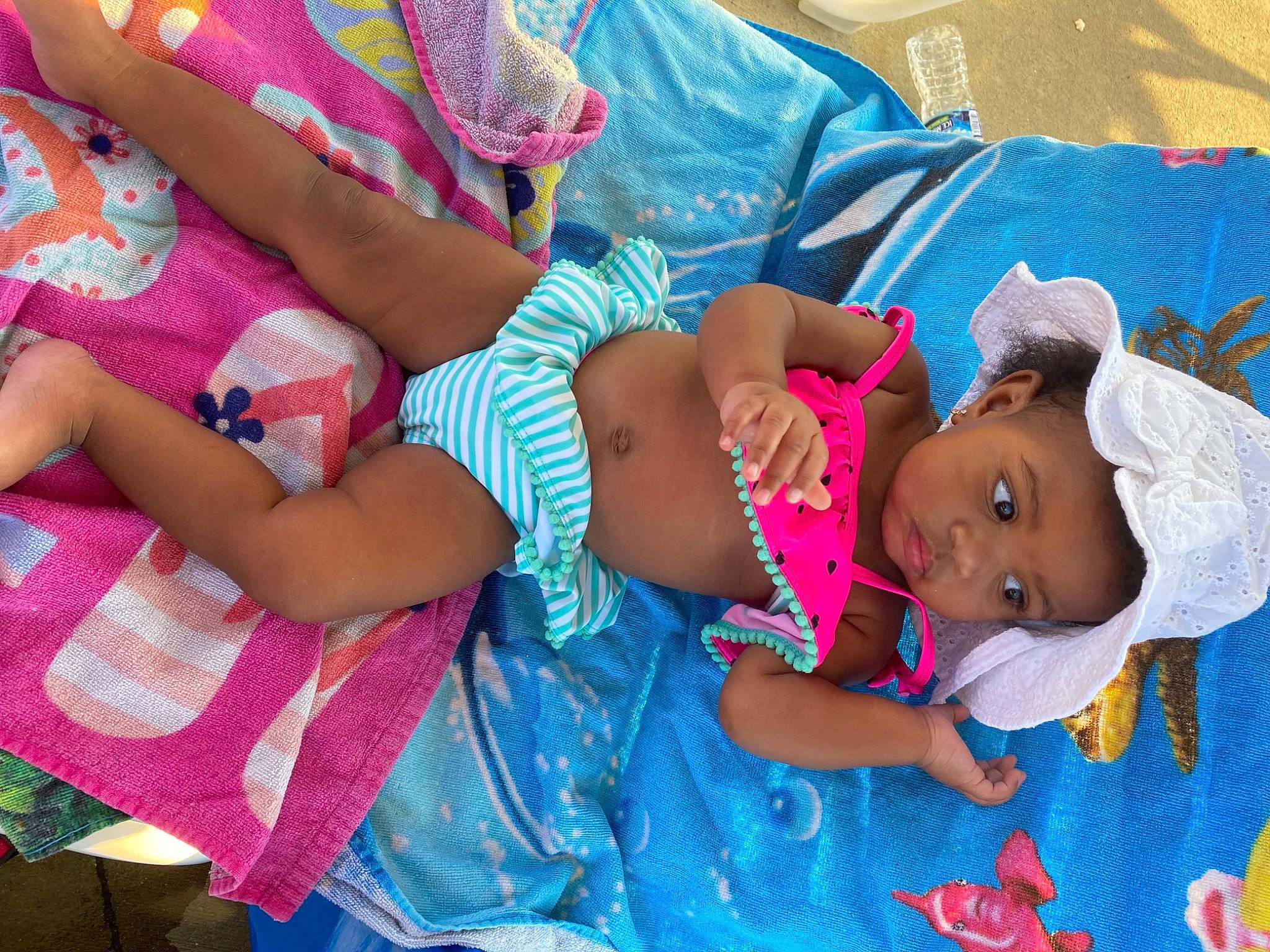 Bianca joined the competition — help win amazing prizes! arm, baby, baby_toddler_clothing, child, comfort, facial_expression, fun, happy, hat, human, human_body, leg, pattern, person, pink, summer, sunglasses, t_shirt, textile, thigh