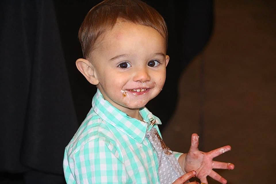 Dash is registered to the contest to win money with this photo: baby_toddler_clothing, cheek, child, chin, ear, eye, eyebrow, facial_expression, finger, forehead, happy, iris, joy, mouth, nose, organ, pattern, person, shirt, skin