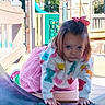 Elsie joined the competition — help win amazing prizes! activity, bow, casual, child, colorful_clothing, crawling, cute, daylight, face, fun, girl, hands, outdoor, pink_skirt, play_structure, playground, serious_expression, tunnel, wooden_playhouse, young_child