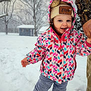 Elsie joined the competition — help win amazing prizes! child, cold, daytime, footwear, happy, hat, holding_hand, jacket, nature, outdoor, pants, park, person, playing, seasonal, smiling, snow, toddler, trees, winter