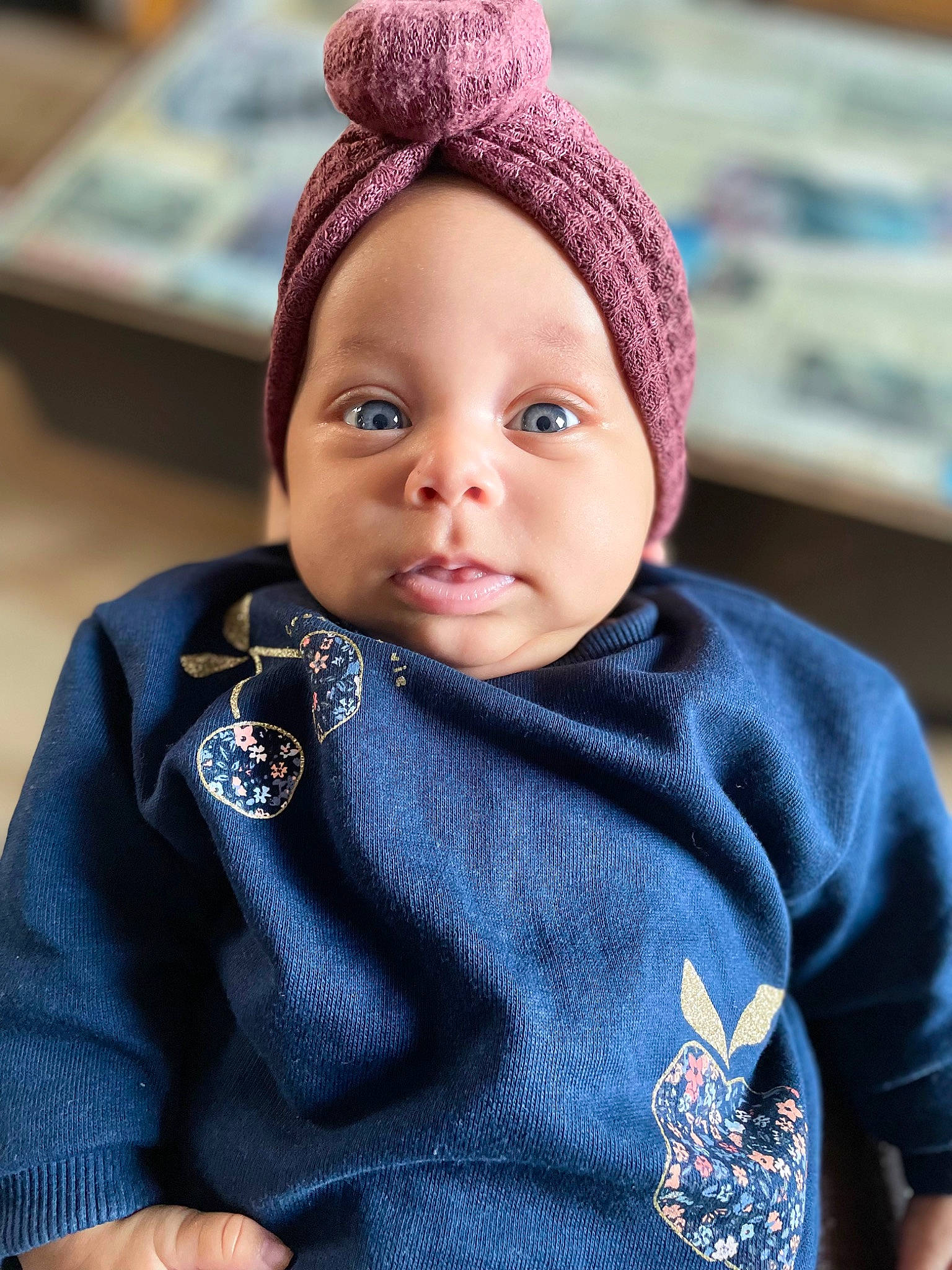Lexie participe au concours pour gagner de l'argent avec cette photo : baby, baby_toddler_clothing, cap, cheek, child, electric_blue, eye, eyebrow, face, happy, knit_cap, outerwear, person, skin, sleeve, street_fashion, textile, toddler, white, wool