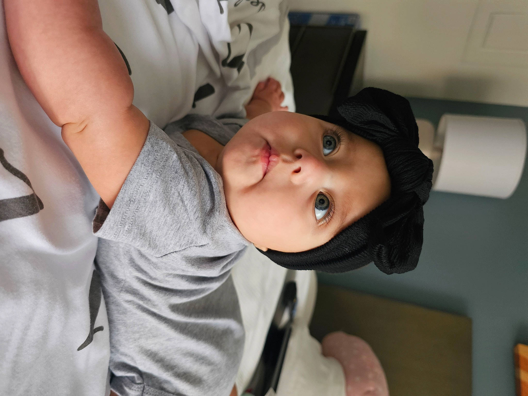 Sofia is registered to the contest to win money with this photo: baby, baby_products, baby_toddler_clothing, cap, cheek, chest, child, comfort, elbow, eyelash, fun, gesture, hat, headwear, joint, mouth, nose, person, room, skin