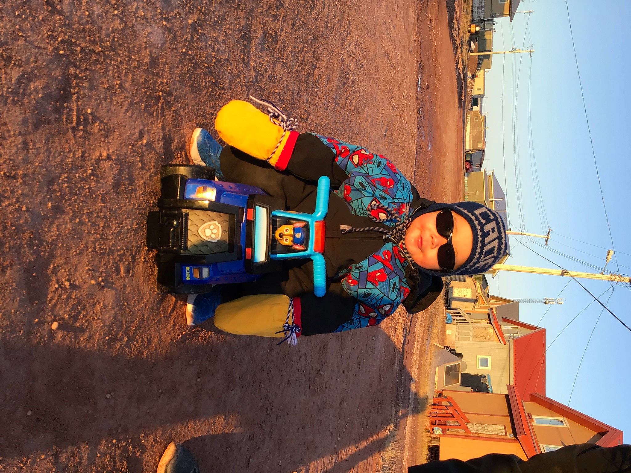 Cade joined the competition — help win amazing prizes! adventure, asphalt, electric_blue, extreme_sport, facade, fun, headwear, landscape, leisure, machine, person, recreation, shadow, shorts, sky, smile, soil, travel, walking_shoe, window