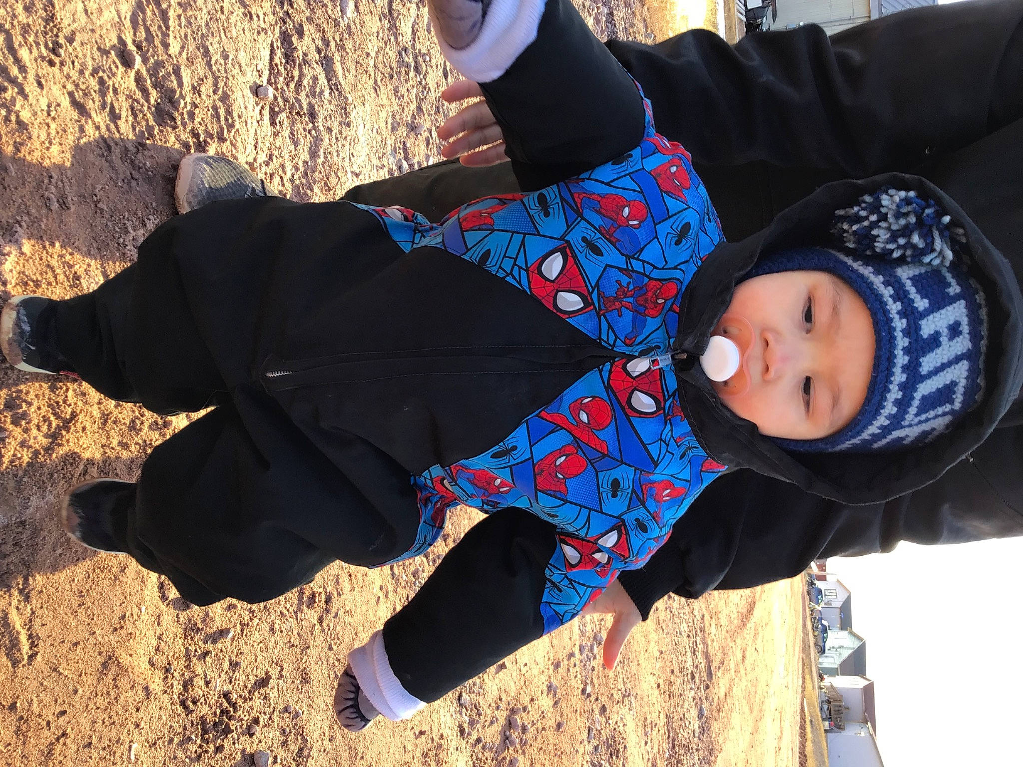 Cade joined the competition — help win amazing prizes! baby, beanie, child, electric_blue, fashion_accessory, freezing, fun, happy, hat, headwear, leaf, leisure, person, plant, play, recreation, shadow, sitting, soil, toddler