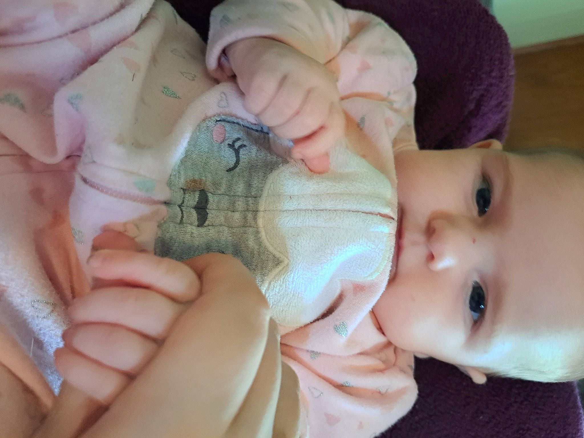 Lilian is registered to the contest to win money with this photo: baby, baby_toddler_clothing, cheek, chin, comfort, eye, eyelash, finger, gesture, hand, lip, mammal, mouth, nail, nose, person, pink, product, skin, thumb