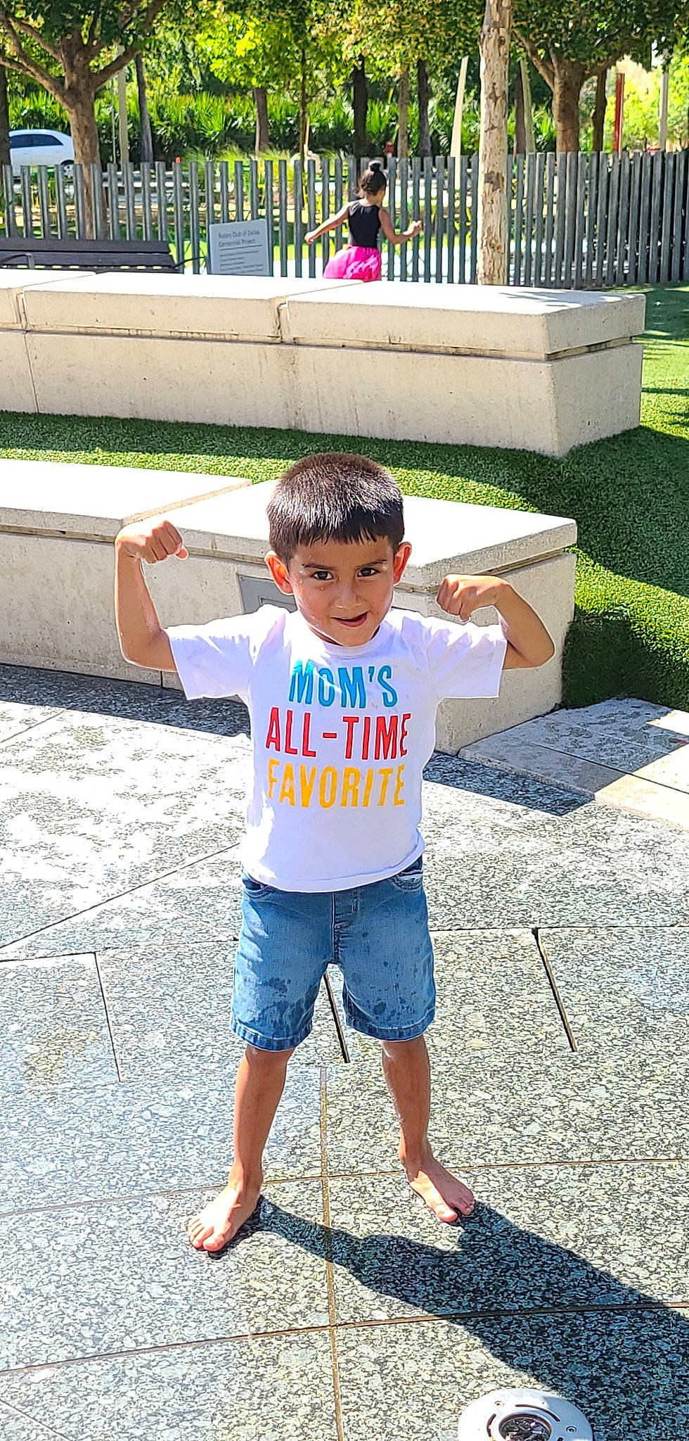 Sotero is registered to the contest to win money with this photo: asphalt, barefoot, child, concrete, denim, fun, grass, happy, landscape, leisure, person, photograph, plant, recreation, sandal, sleeve, summer, t_shirt, toddler, tree