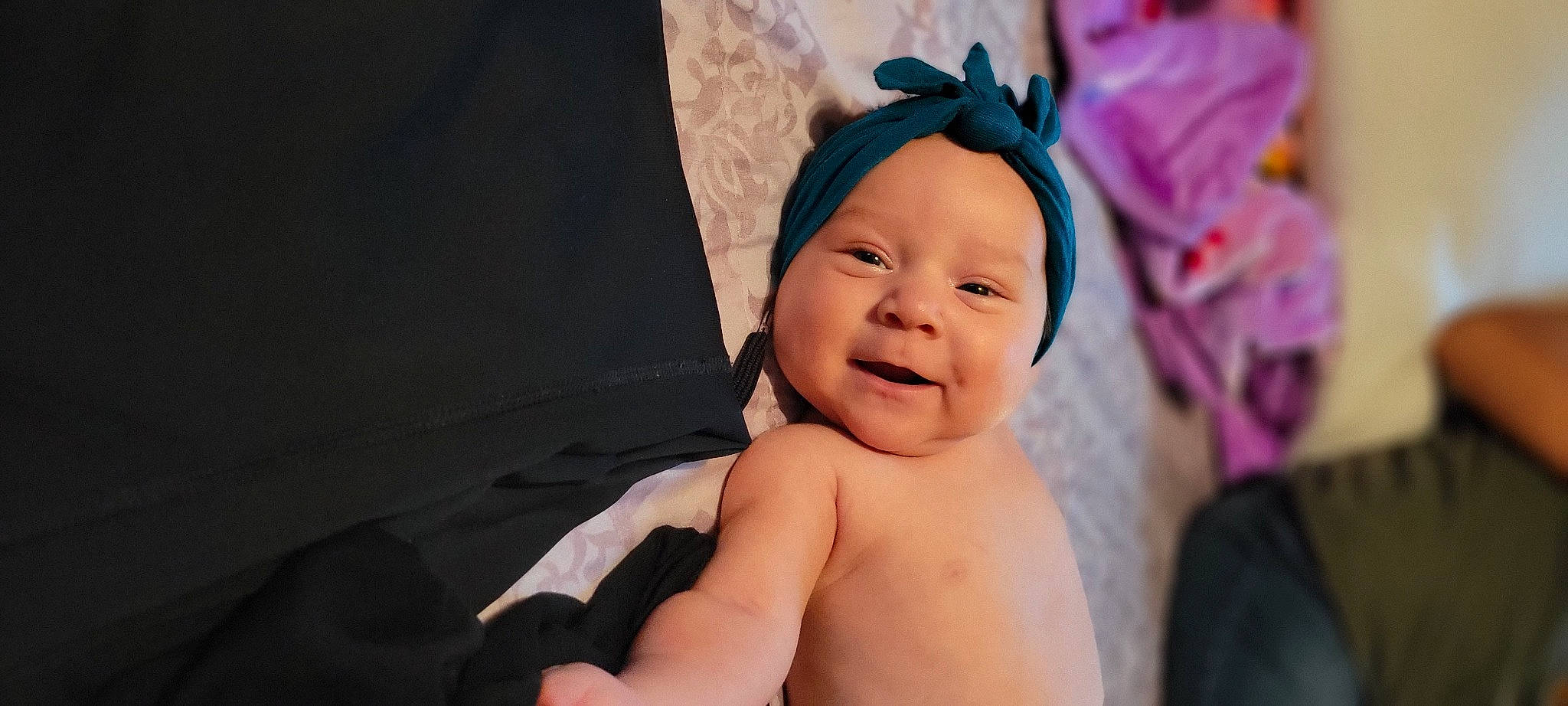 Sophia Rose is registered to the contest to win money with this photo: baby, cap, cheek, child, chin, comfort, eye, eyebrow, face, fun, gesture, happy, head, headpiece, headwear, human_body, iris, lip, person, skin