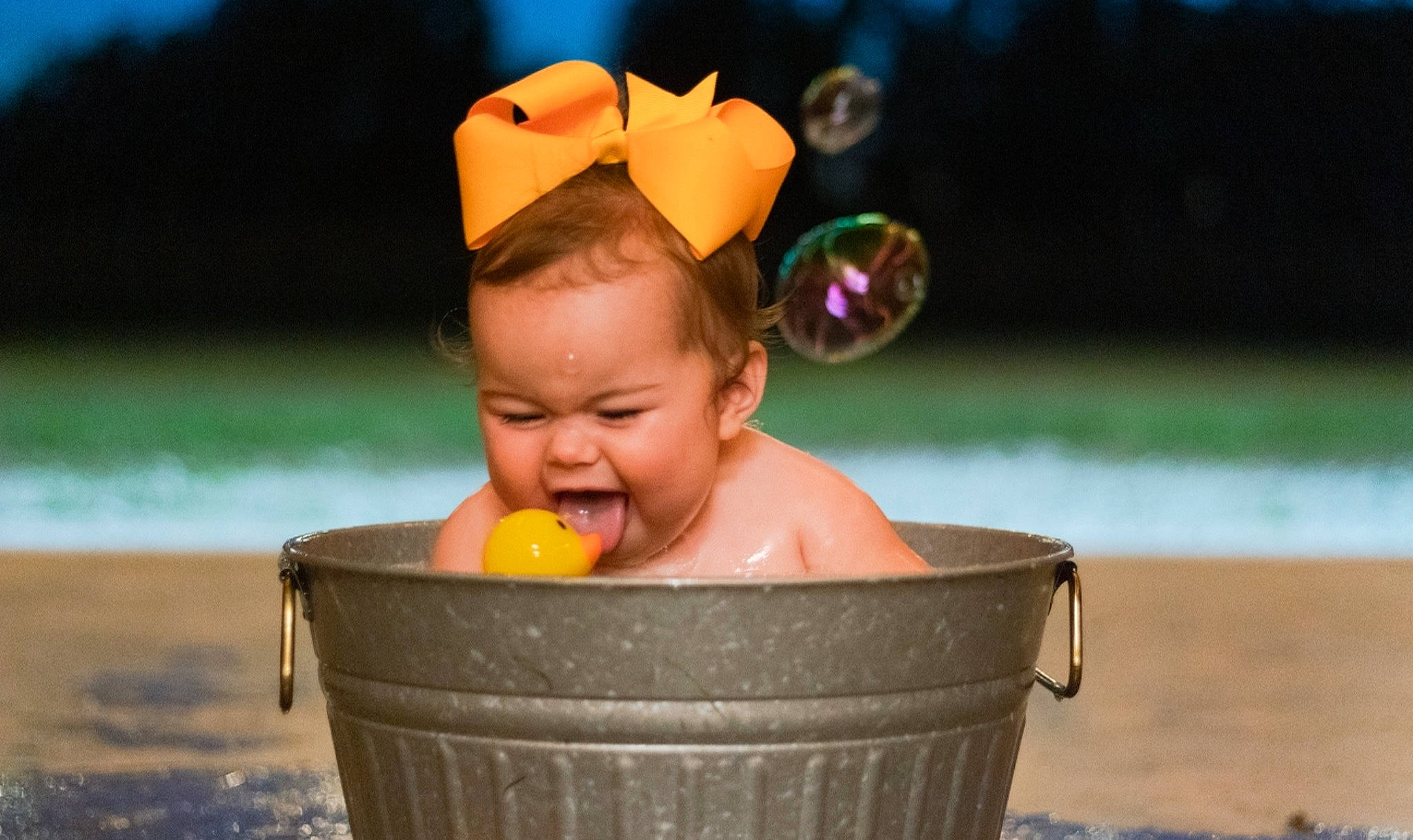 Elisabeth joined the competition — help win amazing prizes! baby, baby_products, bathing, child, event, facial_expression, fun, grass, happy, headgear, leisure, person, personal_protective_equipment, play, recreation, smile, summer, swimming_pool, toddler, vacation