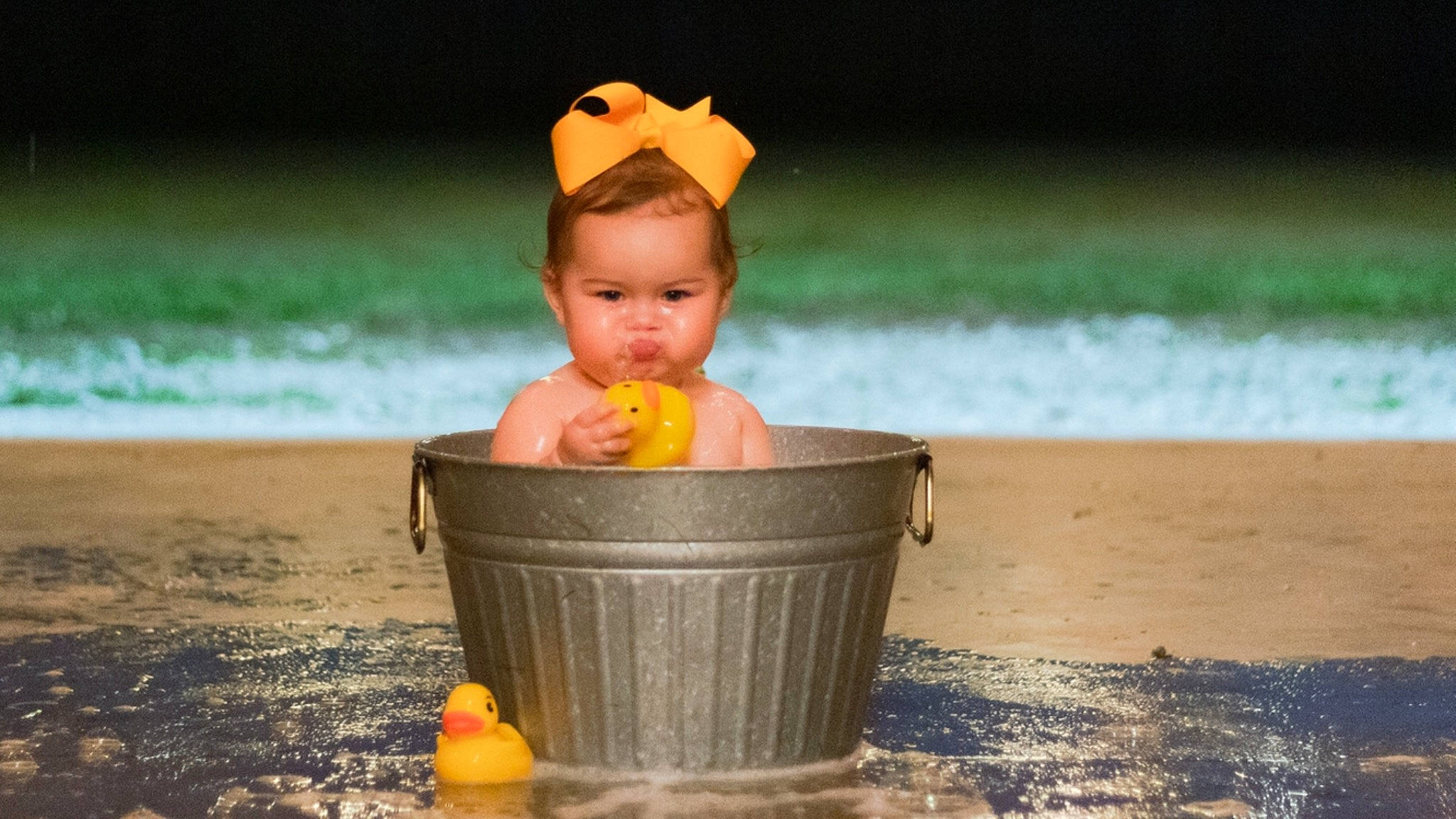 Elisabeth is registered to the contest to win money with this photo: baby, baby_toddler_clothing, beach, beauty, child, eye, facial_expression, fun, goggles, happy, leisure, people_in_nature, person, personal_protective_equipment, recreation, sand, summer, toddler, toy, water