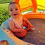 baby, face, grass, happy, head, laughing, outdoorplayarea, outdoors, person, photography, plant, playarea, pool, portrait, sitting, slide, summer, swimmingpool, toy, water