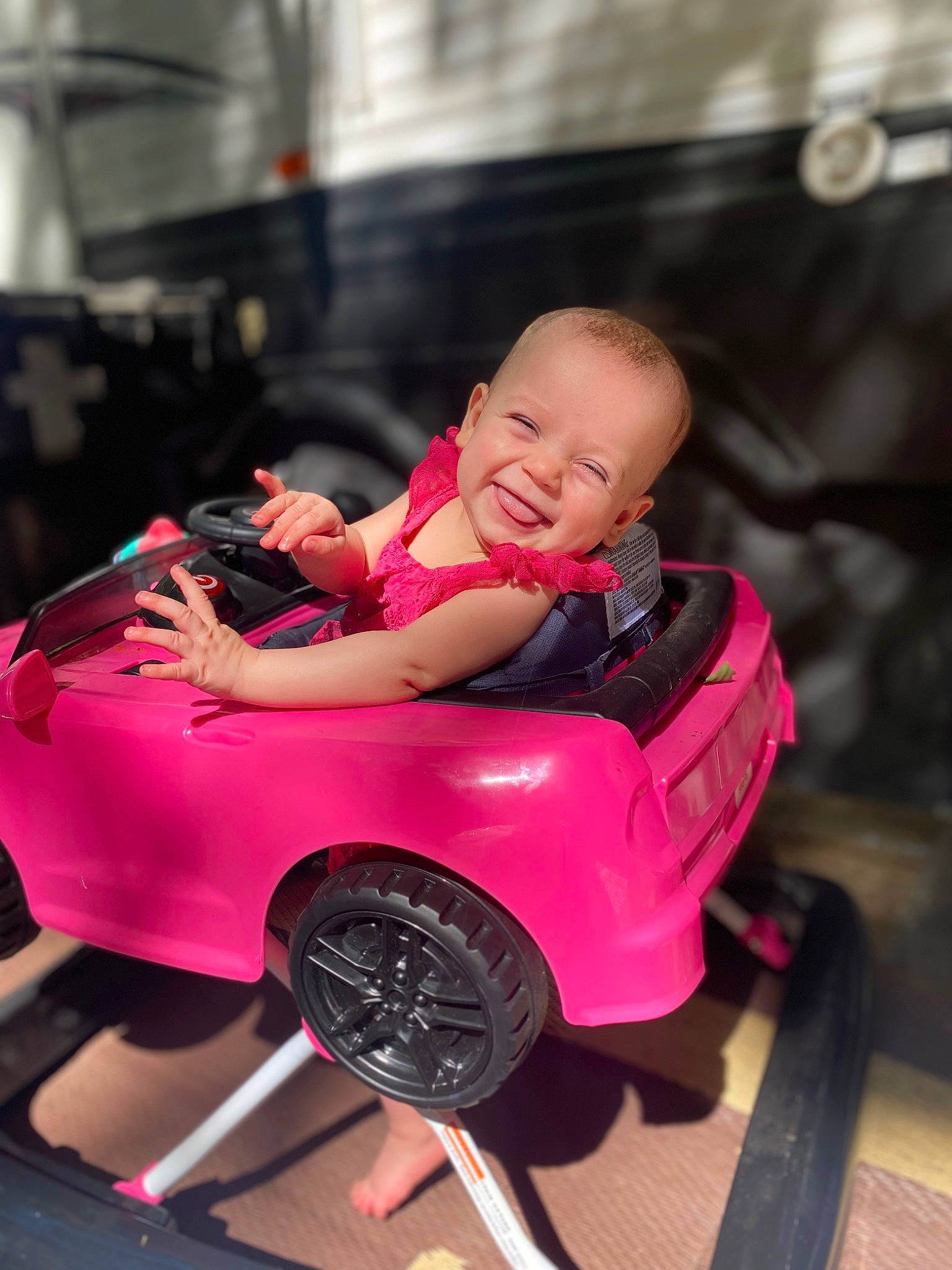Kalianne joined the competition — help win amazing prizes! auto_part, automotive_design, automotive_exterior, automotive_lighting, automotive_tire, automotive_wheel_system, baby, fender, happy, magenta, motor_vehicle, person, pink, riding_toy, rolling, smile, tire, toddler, toy, vehicle