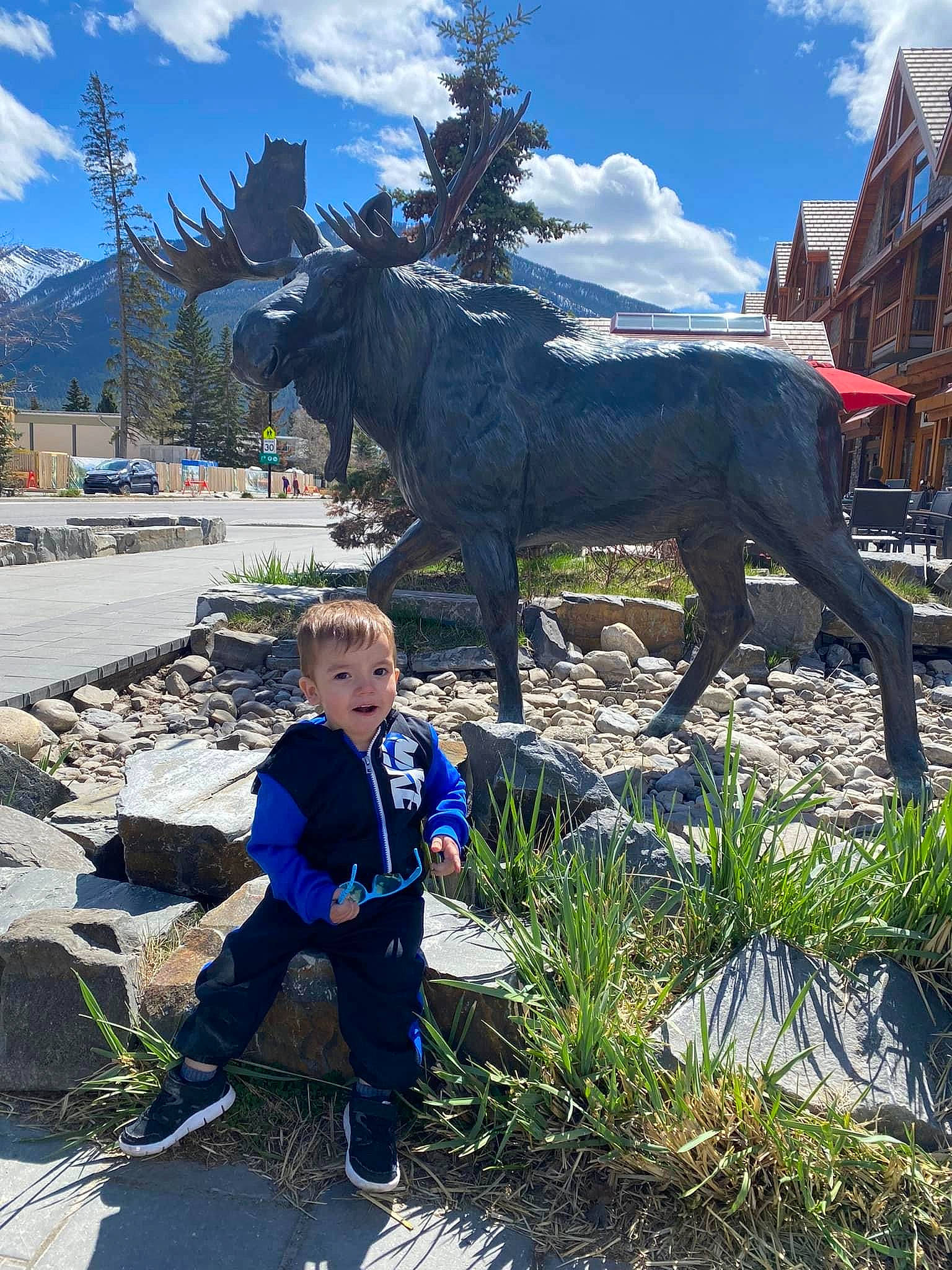 Kylan is registered to the contest to win money with this photo: art, bull, cloud, electric_blue, landscape, leisure, livestock, metal, ox, pack_animal, person, plant, sculpture, sky, statue, tourism, travel, tree, wilderness, winter