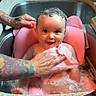 baby, bath, sink, soap, bubbles, pink_cushion, tattooed_hands, water, kitchen, cleaning, child, smile, cute, foam, wet_hair, infant, happy, person, toddler, parenting