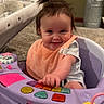 Valentina joined the competition — help win amazing prizes! baby, child, smiling, indoor, activity_walker, bib, toy, play, happy, person, carpet, home, furniture, hair, cute, infant, colorful, plastic, seat, floor