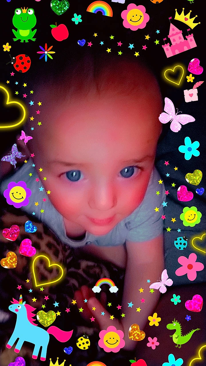 Jerry is registered to the contest to win money with this photo: art, beauty, child, christmas_decoration, circle, design, event, fun, graphic_design, graphics, happy, interior_design, light, lighting, magenta, ornament, pattern, people_in_nature, person, pink