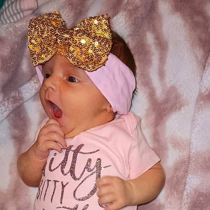 Nadine joined the competition — help win amazing prizes! baby, baby_sleeping, baby_toddler_clothing, cap, costume_hat, event, eyebrow, eyelash, face, fashion_accessory, gesture, happy, headband, headpiece, headwear, jewellery, lip, pattern, person, sleeve