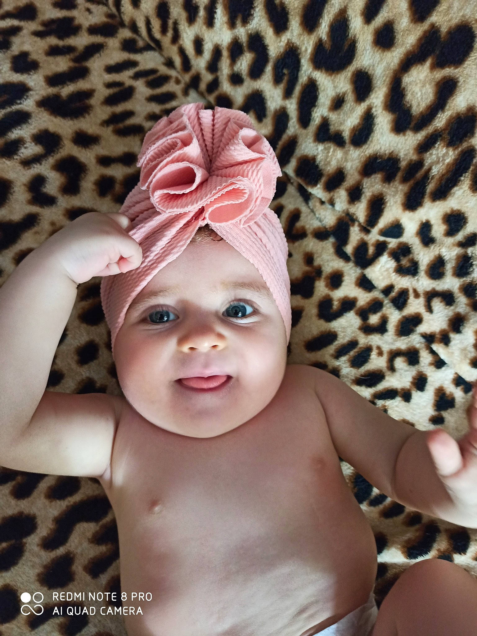 Louïse a rejoint le concours — aidez-le/la à gagner de superbes lots ! baby, baby_toddler_clothing, bonnet, cap, child, costume_accessory, ear, fashion_accessory, hair_accessory, hat, head, headgear, headwear, person, photography, pink, skin, smile, toddler
