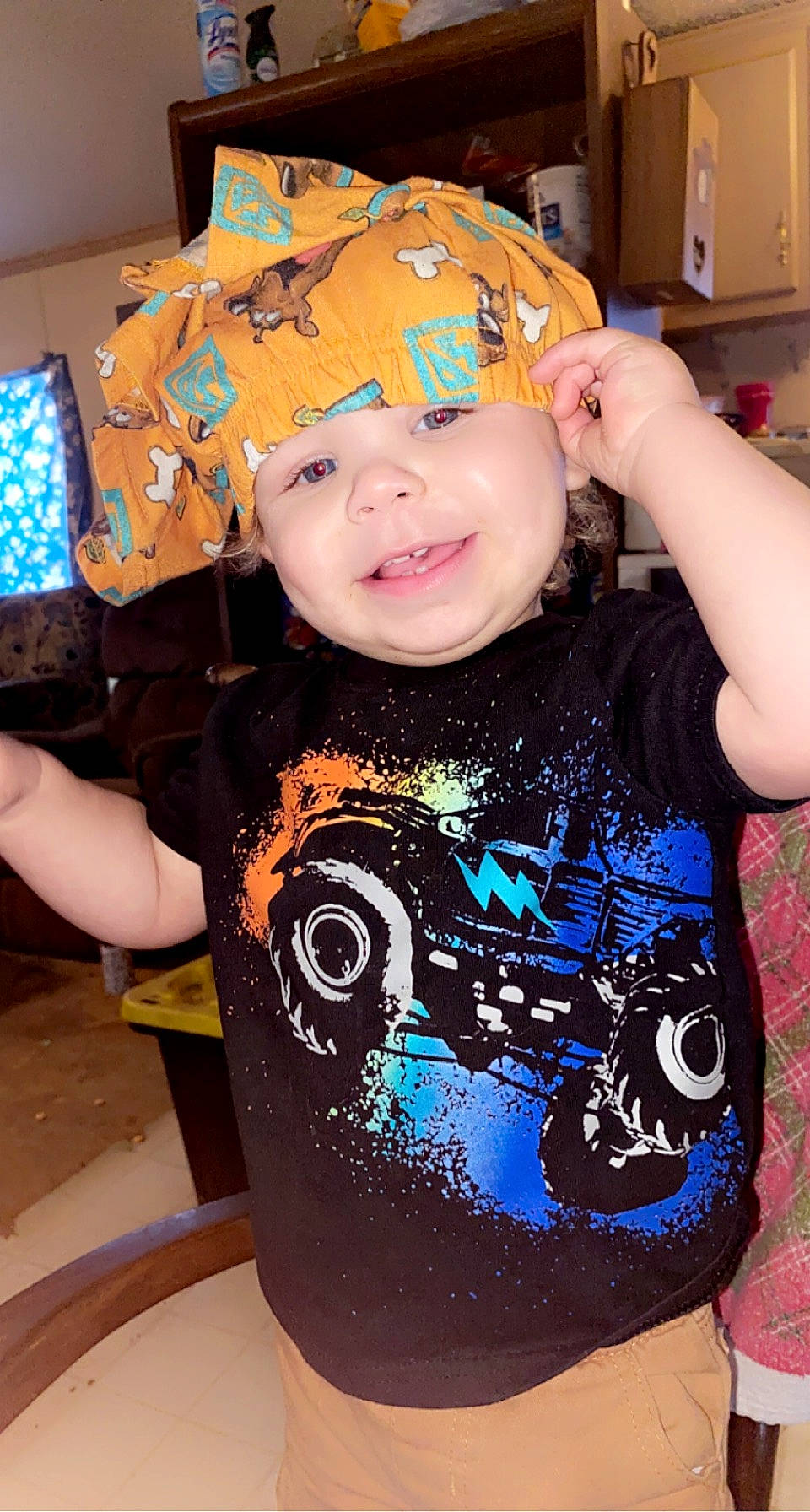 Andre is registered to the contest to win money with this photo: baby_toddler_clothing, baseball_cap, cap, chest, child, cool, electric_blue, facial_expression, fashion_accessory, fun, happy, head, headwear, party_supply, pattern, person, personal_protective_equipment, sleeve, smile, t_shirt