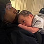 Elijah is registered to the contest to win money with this photo: affection, baby, closeup, clothing, family, head, holding, home, indoor, infant, kissing, love, man, newborn, person, portrait, resting, skin, sleepy, tenderness