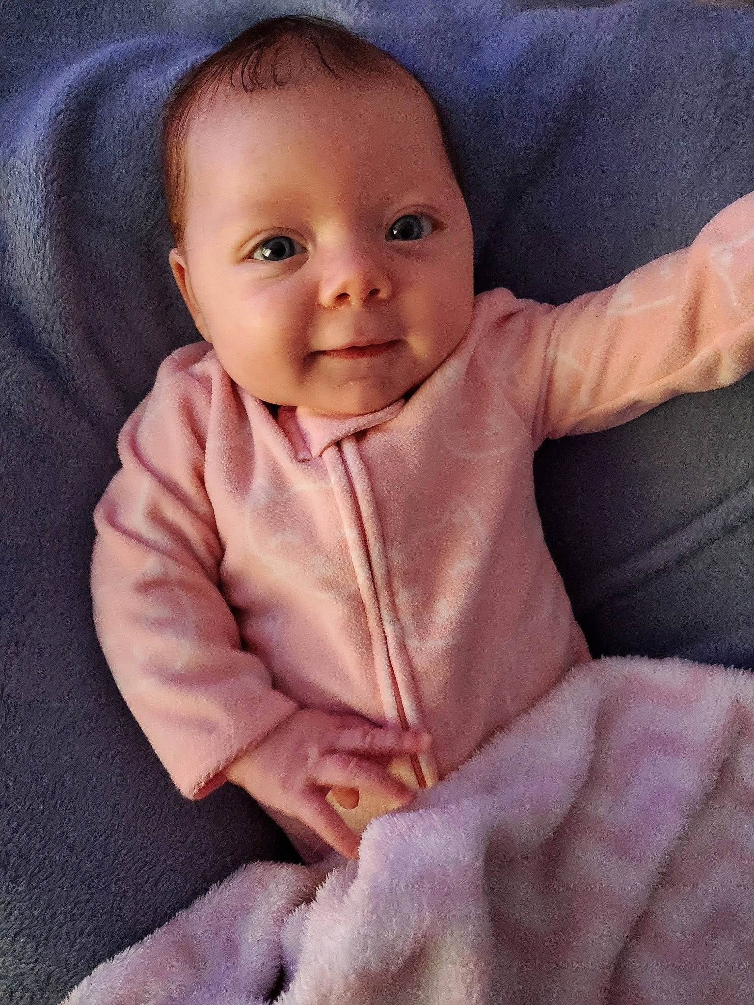 Paisley is registered to the contest to win money with this photo: baby, cheek, child, eye, face, finger, gesture, hand, head, lip, mouth, nose, person, sitting, skin, smile, thumb, toddler