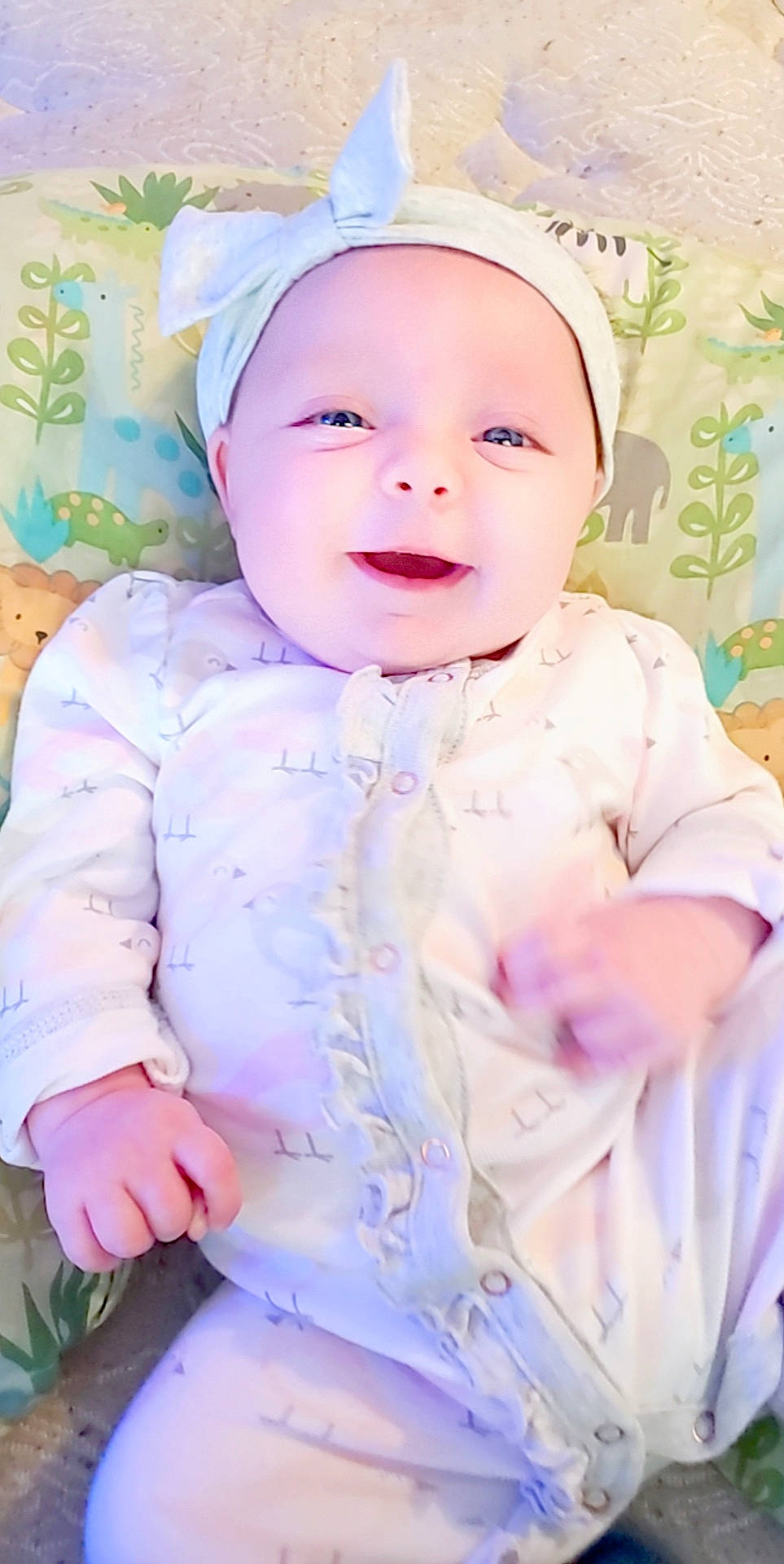 Paisley is registered to the contest to win money with this photo: baby, baby_products, baby_toddler_clothing, cheek, child, head, lavender, person, pink, portrait, product, skin, sleeve, smile, toddler