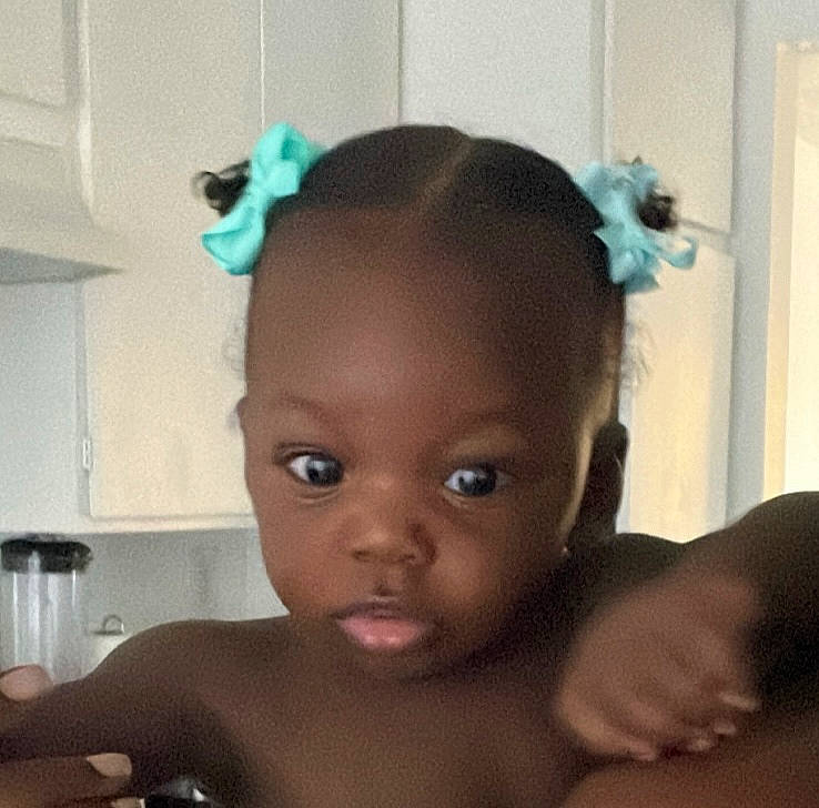 Dior is registered to the contest to win money with this photo: arm, baby, black_hair, cheek, chest, chin, cool, ear, eye, eyebrow, eyelash, forehead, gesture, happy, iris, lip, mouth, neck, nose, person