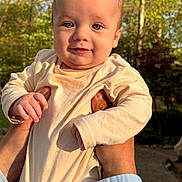 Tucker joined the competition — help win amazing prizes! baby, infant, child, hands, outdoor, nature, greenery, sunlight, portrait, smile, cute, person, face, clothing, long_sleeve, skin, blue_eyes, holding, happy, daylight