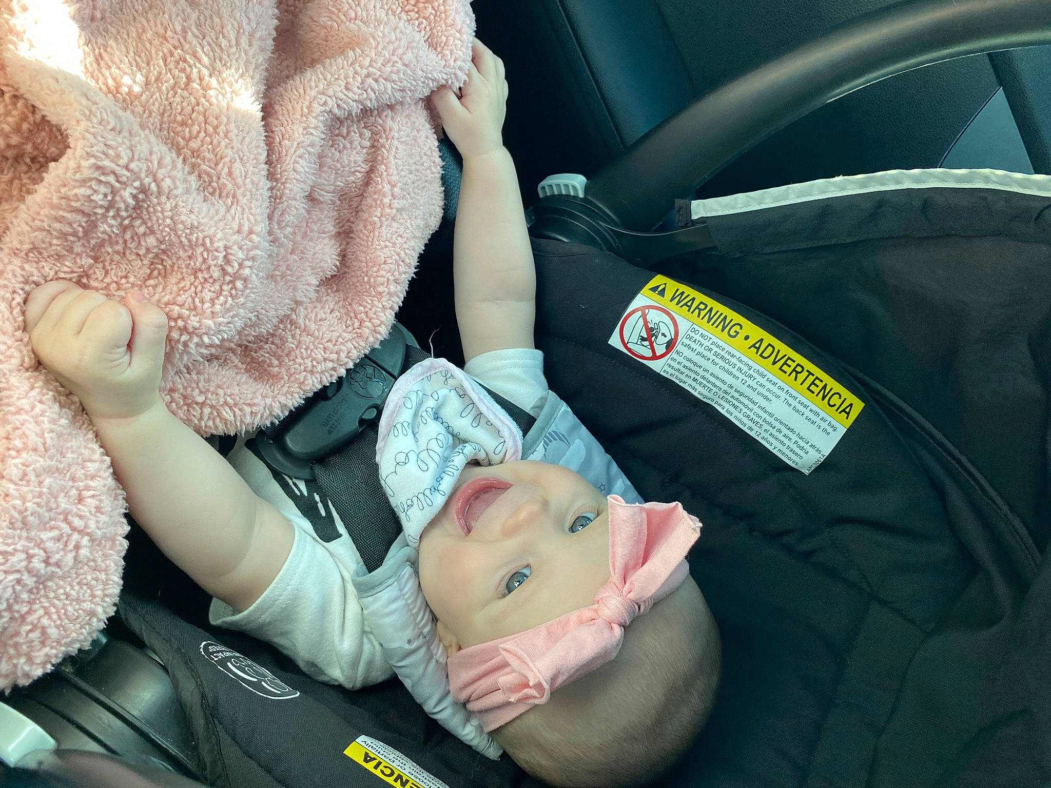 Aria is registered to the contest to win money with this photo: arm, baby, baby_carriage, baby_in_car_seat, baby_products, baby_safety, baby_sleeping, baby_toddler_clothing, car_seat, child, comfort, finger, gesture, hand, headwear, linens, nail, person, product, seat_belt