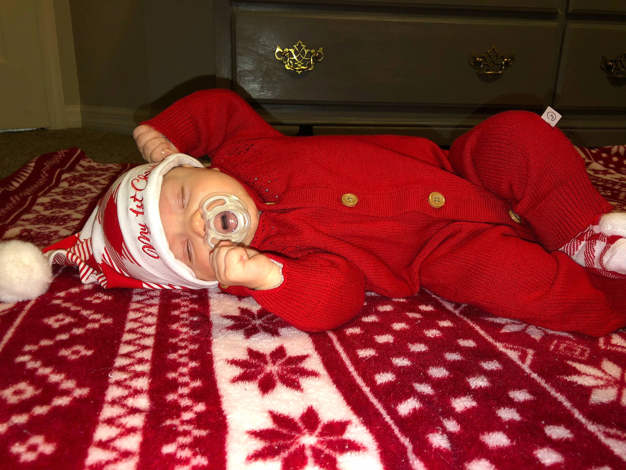 Aria is registered to the contest to win money with this photo: bed, bed_sheet, bedding, bedroom, blanket, carmine, comfort, flooring, headwear, linens, pattern, person, pillow, plaid, red, room, stuffed_toy, textile, throw_pillow, toy