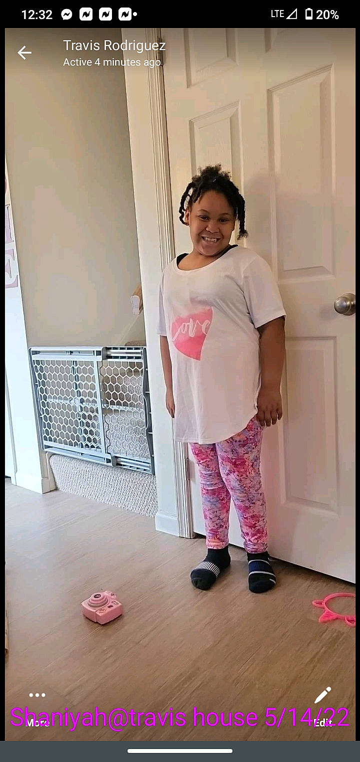 Shaniyah is registered to the contest to win money with this photo: baby_toddler_clothing, child, door, fashion_design, flooring, happy, joy, knee, magenta, pattern, person, pink, product, room, shorts, shoulder, sleeve, smile, t_shirt, textile