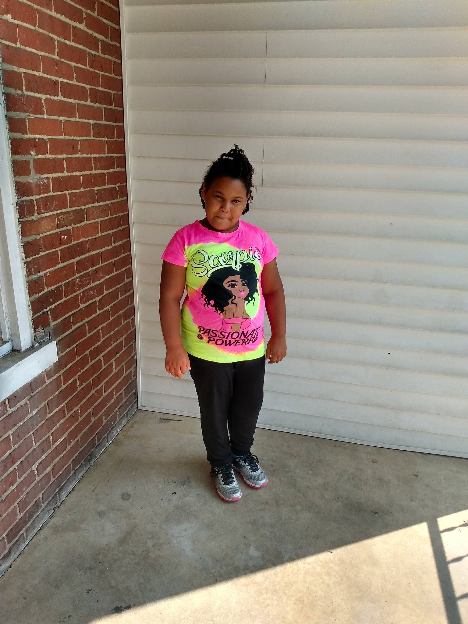 Shaniyah joined the competition — help win amazing prizes! brick, brickwork, door, electric_blue, eyewear, fun, happy, human_leg, knee, leisure, magenta, person, pink, recreation, sleeve, sportswear, t_shirt, thigh, tints_and_shades, waist